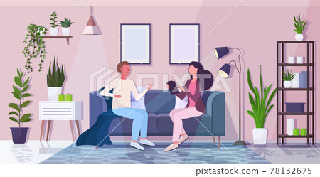 man with psychologist sitting on sofa psychotherapist consulting patient during psychotherapy session 78132675