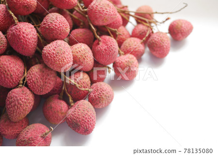 Lychee on a white background top down. Lychee on a white background top down. 78135080