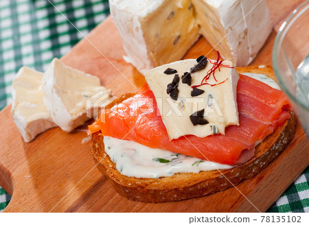 Canape with cambozola cheese and salmon Canape with cambozola cheese and salmon 78135102