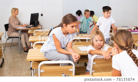 Kids pupils talking during recess between lessons 78135874