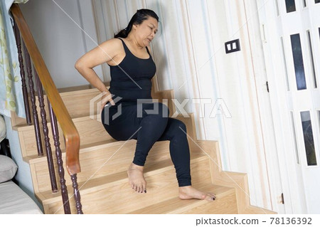 Asian middle-aged lady woman patient fall down the stairs because slippery surfaces 78136392