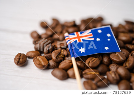 Australia flag on coffee beans; import export drink food concept. Australia flag on coffee beans; import export drink food concept. 78137629