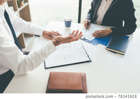 Attractive young business woman in a job interview with a corporate personnel manager 78141928