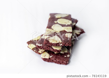 crispy brownies cracker snack with almond nut on white 78143119