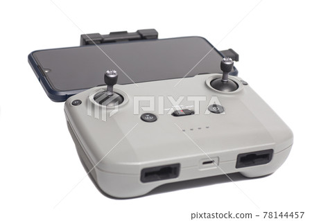 remote control for from quadcopter drone aerial camera with smartphone isolated on white background remote control for from quadcopter drone aerial camera with smartphone isolated on white background 78144457