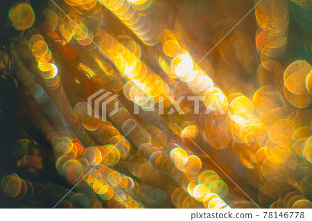 Golden streamers with sparkling glitter. Christmas holidays background Golden streamers with sparkling glitter. Christmas holidays background 78146778