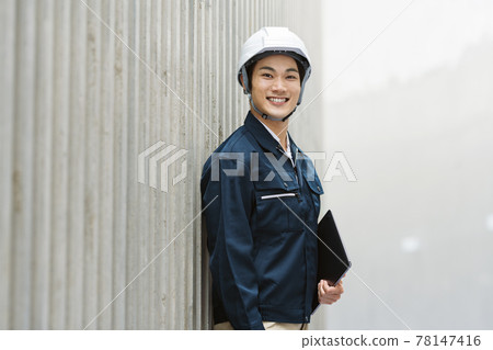 Portrait of a man in construction management 78147416