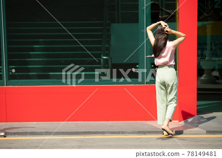 Female feels happy to walk street outdoor for shopping Female feels happy to walk street outdoor for shopping 78149481