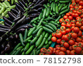 Close-up assortment of many fresh vegetables on supermarket counter 78152798