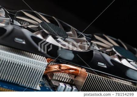 Video card with a cooling system with copper pipes, aluminum radiators and fans. 78154299