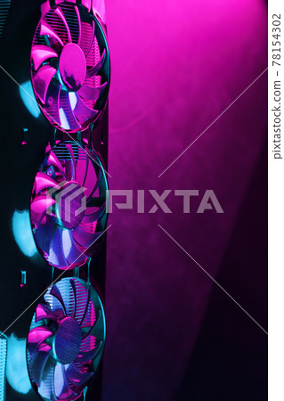 Gaming graphics card with neon magenta-cyan illumination and high-speed fans. 78154302