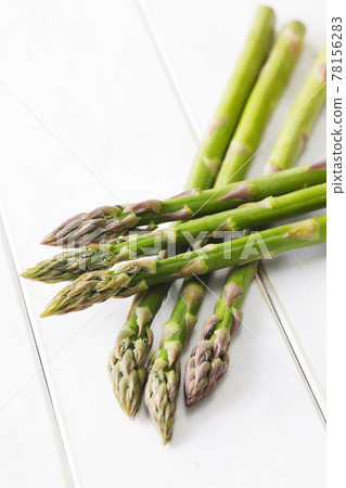 Hokkaido green asparagus on a white board 78156283