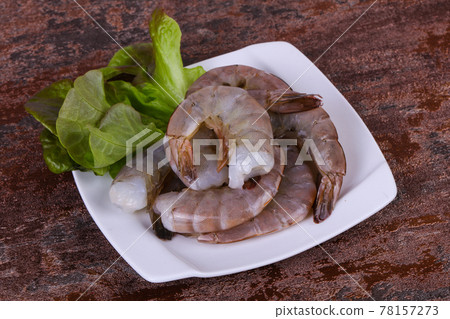 Raw king prawns ready for cooking Raw king prawns ready for cooking 78157273