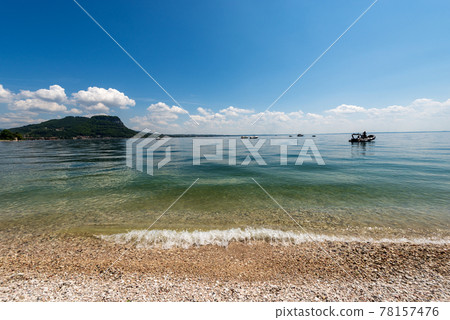 Beautiful Beach on Lake Garda - Lago di Garda Headland of San Vigilio Veneto Italy Beautiful Beach on Lake Garda - Lago di Garda Headland of San Vigilio Veneto Italy 78157476
