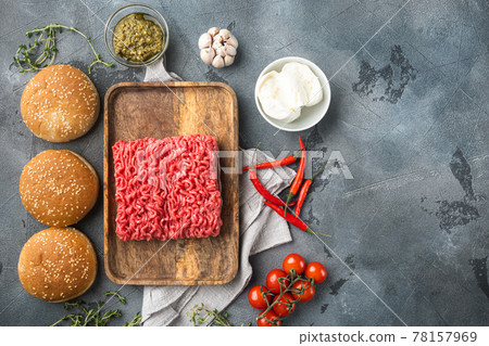 Home Raw Minced Beef Meatball burgers ingredients, on wooden tray, on gray stone background, top view flat lay, with copy space for text 78157969