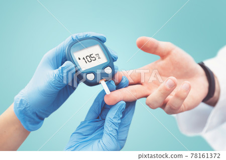 Doctor making blood sugar test. Diabetes treatment 78161372