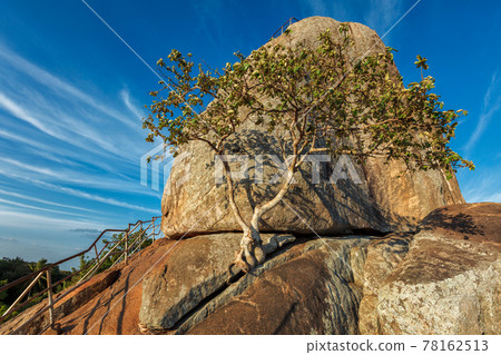 Meditation rock in Mihintaleon sunset, Sri Lanka Meditation rock in Mihintaleon sunset, Sri Lanka 78162513