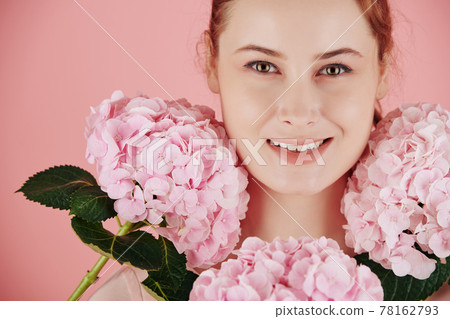 Hydrangea flowers around face Hydrangea flowers around face 78162793