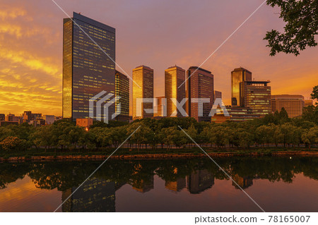 Beautiful evening view of Osaka Business Park (OBP) seen from Osaka Castle Park Beautiful evening view of Osaka Business Park (OBP) seen from Osaka Castle Park 78165007