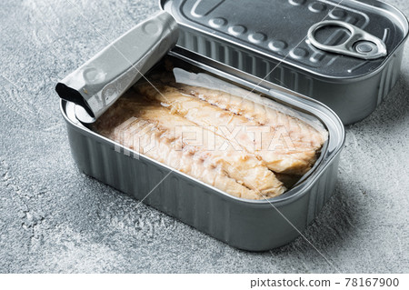 Canned Mackerel Fillets in Tin, in tin can, on gray background Canned Mackerel Fillets in Tin, in tin can, on gray background 78167900