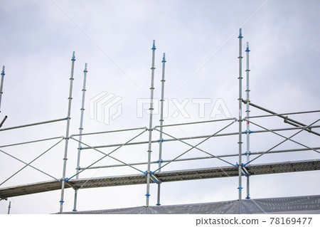 Construction site scaffolding 78169477