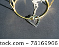 Heart pendant necklace symbol of love Romance Valentine's Day Closeup shoot in a summer day. Selective Focus 78169966