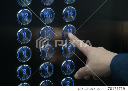 Hand push the elevator button 11th floor Hand push the elevator button 11th floor 78173739