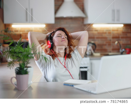 Funky hipster woman listening favorite song or music podcast Funky hipster woman listening favorite song or music podcast 78174865