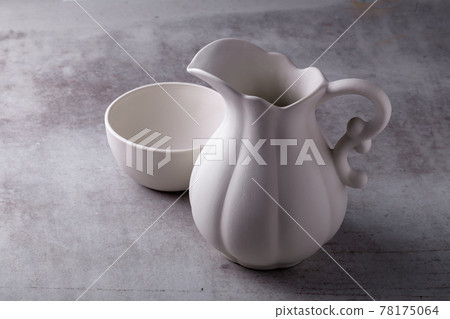 Teapot creamer, Cup and saucer on Cement Board Teapot creamer, Cup and saucer on Cement Board 78175064