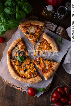 Traditional Italian pizza with cheese and mushrooms Traditional Italian pizza with cheese and mushrooms 78176394