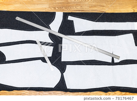 sewing patterns and rulers on wooden table sewing patterns and rulers on wooden table 78176467
