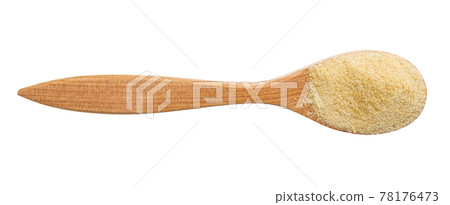 top view of granulated coconut sugar in wood spoon 78176473
