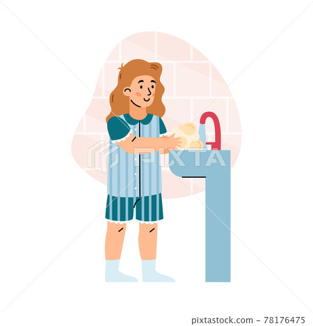 Cute young child girl washing hands with water and soap in sink at bathroom. 78176475