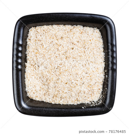 top view of psyllium husk in black bowl isolated top view of psyllium husk in black bowl isolated 78176485