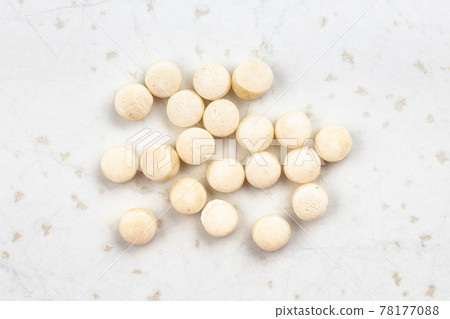 several israeli pearl couscous grains on gray several israeli pearl couscous grains on gray 78177088