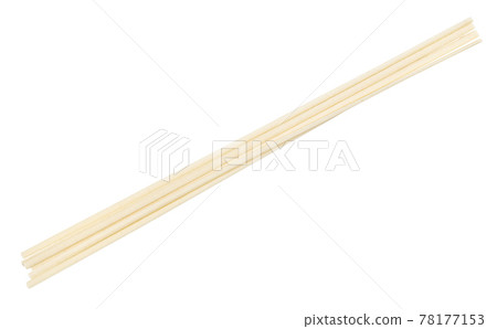 few dried round Udon noodles from wheat isolated 78177153