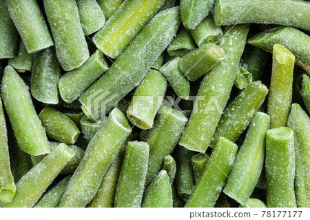 background - many cut and frozen green beans 78177177