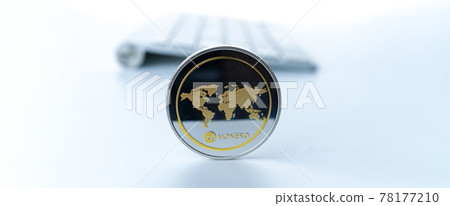Monero wallet. Golden Bit Coin virtual cryptocurrency or blockchain technology. Gold Crypto currency BTC with keyboard on white background. Investing in virtual assets, Bull market trend concept. Monero wallet. Golden Bit Coin virtual cryptocurrency or blockchain technology. Gold Crypto currency BTC with keyboard on white background. Investing in virtual assets, Bull market trend concept. 78177210