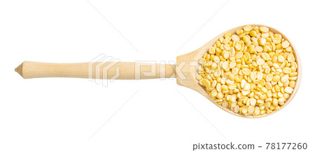 top view of raw moong dal beans in spoon isolated 78177260