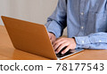 Senior man enjoying surfing the internet 78177543