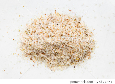 top view of pile of psyllium husk close up on gray 78177865