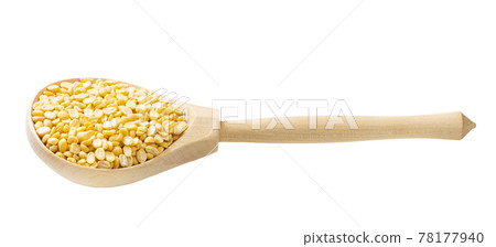 raw moong dal beans in wooden spoon isolated 78177940