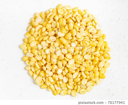 pile of raw moong dal (split green mung) beans 78177941