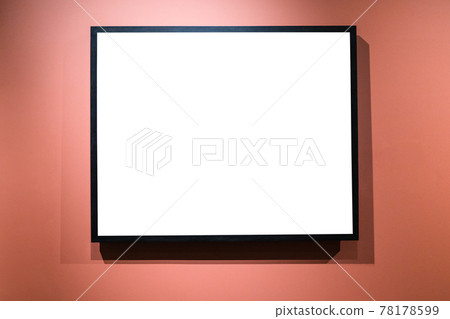 narrow black picture frame on red wall 78178599