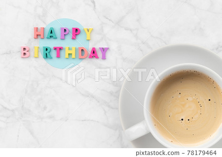 Happy birthday text from wooden colorful letters with cup of coffee 78179464