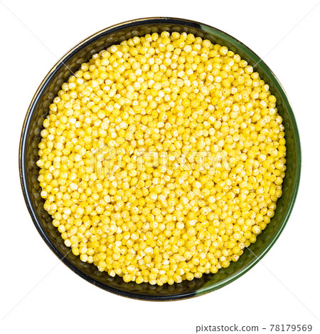 polished proso millet in round bowl isolated 78179569