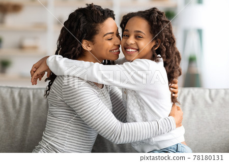 Sweet african american girl spending time with her mother 78180131
