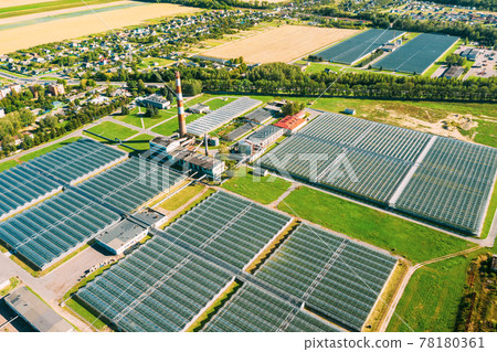 Aerial View Greenhouses For Growing Flowers, Vegetables And Fruits. Agricultural And Industrial Buildings 78180361