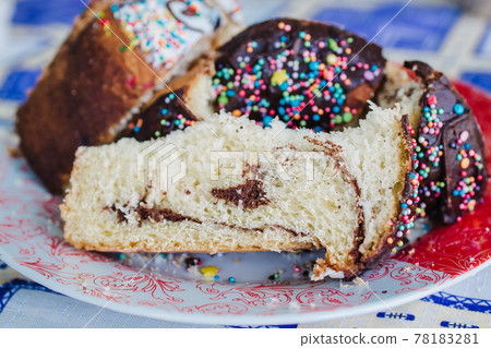 traditional Easter cake cut into chunks on a plate traditional Easter cake cut into chunks on a plate 78183281