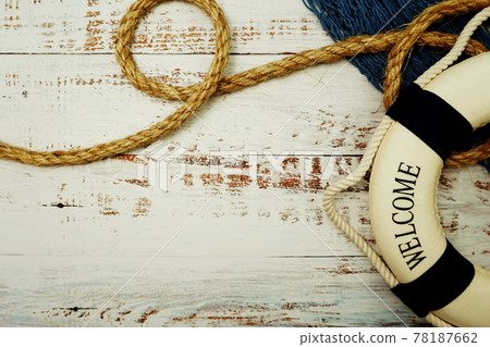 Lifebuoy Marine Decoration with space copy on wooden background 78187662